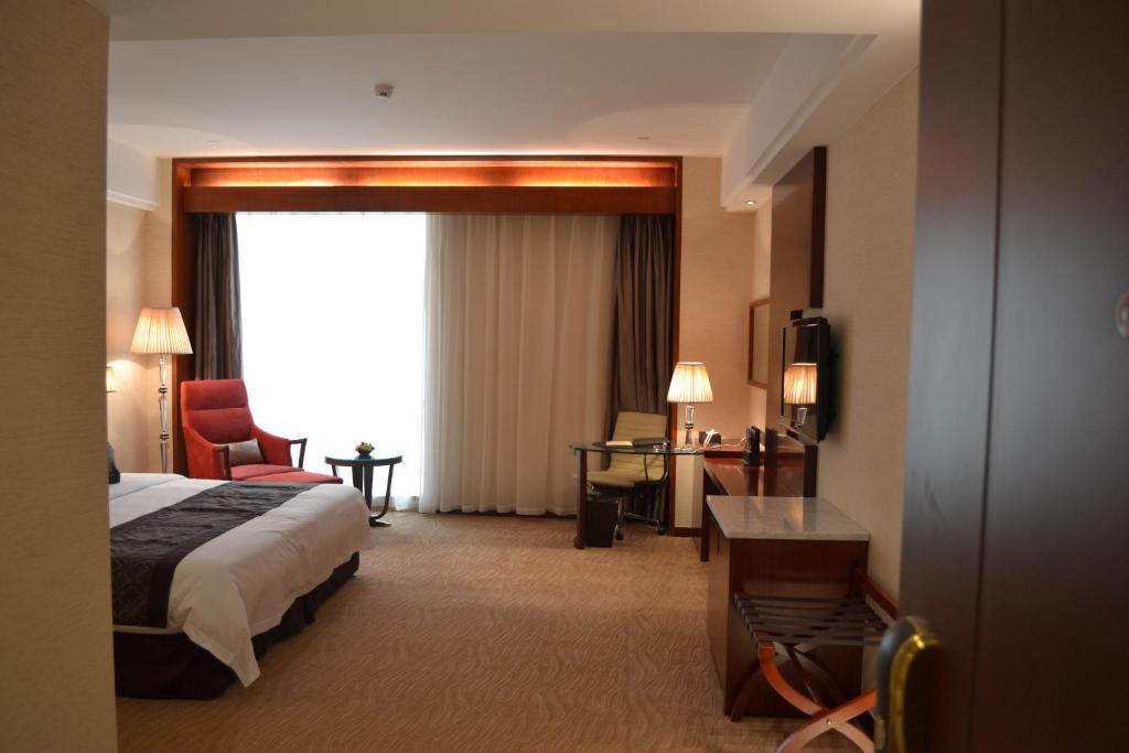 Wuhan Tianchimel Hotel Quarto foto
